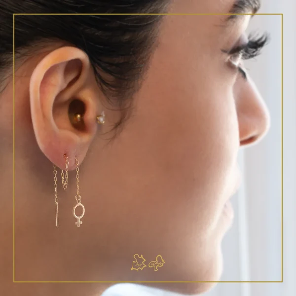 گوشواره طلا بخیه ای نماد زن